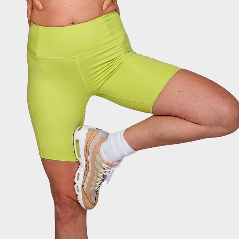 The girlfriend collective bike shorts lime green neon bright XS
